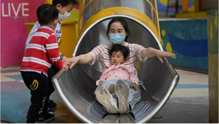 China allows couples to have three children